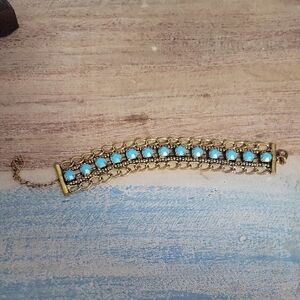 Vintage gold tone chain bracelet with blue beading